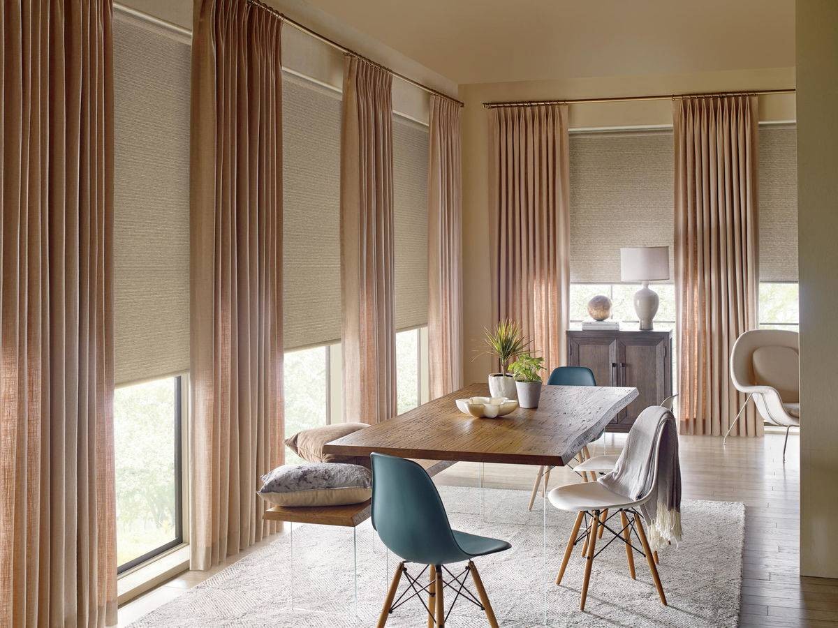 Hunter Douglas drapes providing light control and filtering in a dining area near Kalaheo, HI